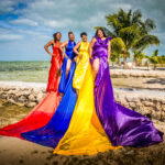 group of women getting flying dress photography done by san pedro belize photographer in ambergris caye